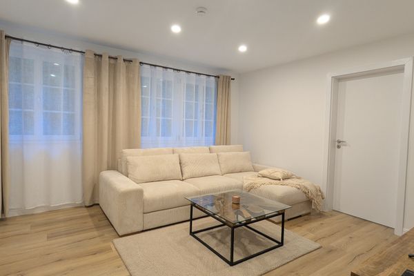 Wohnzimmer mit Schlafsofa