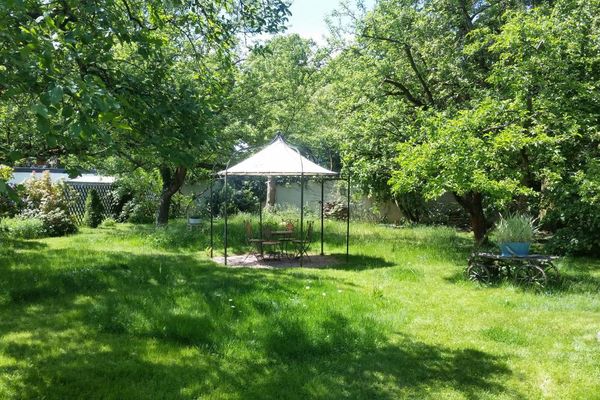 Ferienwohnung Baumgärtel - Garten mit Sitzplatz